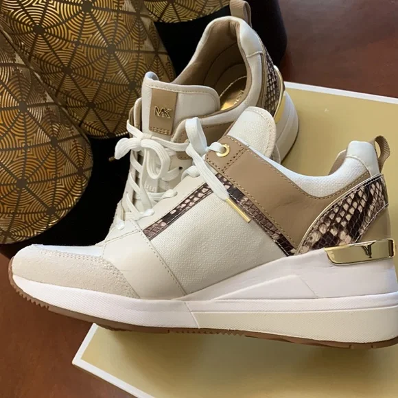Cream clearance wedge trainers